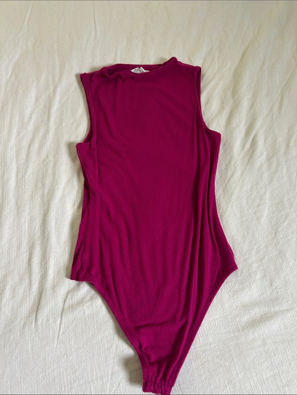 Woman’s Sleeveless Magenta One-Piece Bodysuit